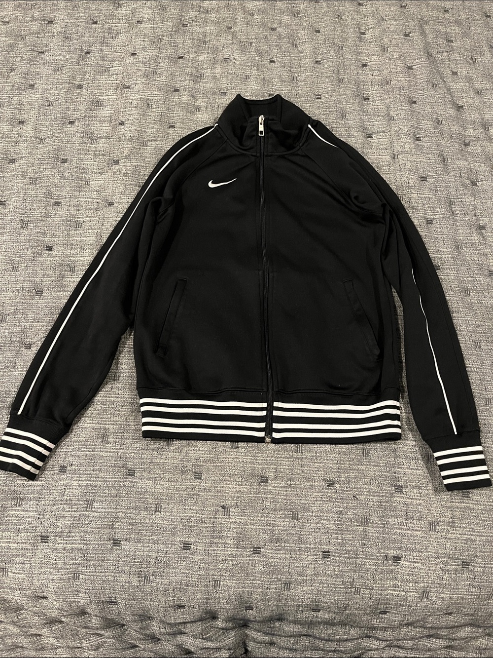 Nike Black Track Jacket with White Piping and Stripe Hem